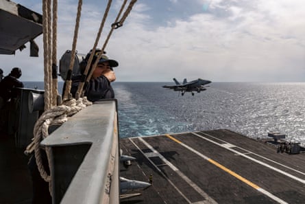 An aircraft landing on the USS Gerald Ford aircraft carrier.
