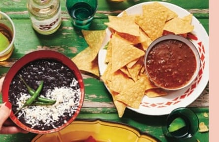 Refried beans with salsa roja and tortilla chips