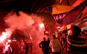 Bosnia fans in the Bosnian capital of Sarajevo celebrate after their team’s 1-0 victory in their 2014 World Cup qualifying match against Lithuania.