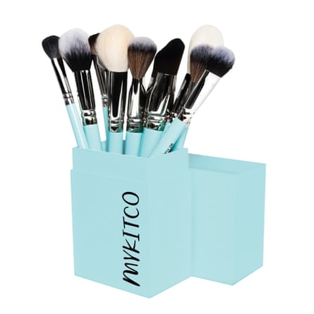 Blue-stemmed makeup brushes in blue box