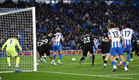 Brighton & Hove Albion’s Ferdi Kadioglu opens the scoring against Chelsea.