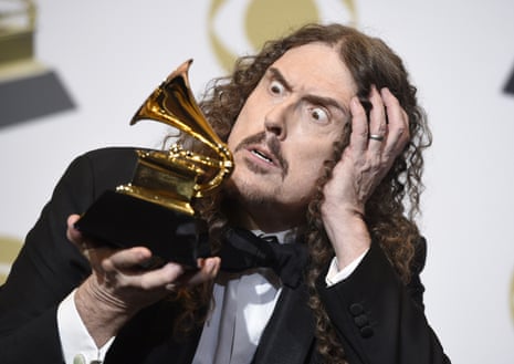 "Weird Al" Yankovic poses in the press room with the award for best boxed or special limited edition package for "Squeeze Box: The Complete Works of 'Weird Al' Yankovic" at the 61st annual Grammy Awards in 2019.