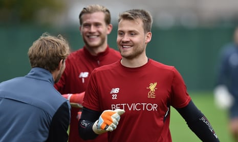 Simon Mignolet, right, will retain his place in the Liverpool starting XI ahead of Loris Karius, centre.
