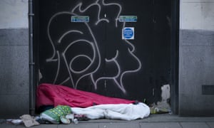 A homeless person sleeping rough in Manchester