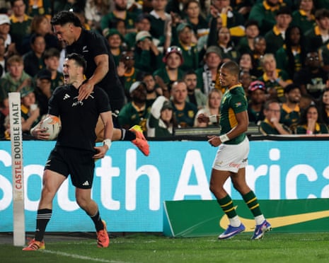 Will Jordan celebrates scoring a try for New Zealand