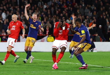 Nottingham Forest's Moussa Niakhate reacts after he handles the ball and a penalty is awarded to Newcastle United.