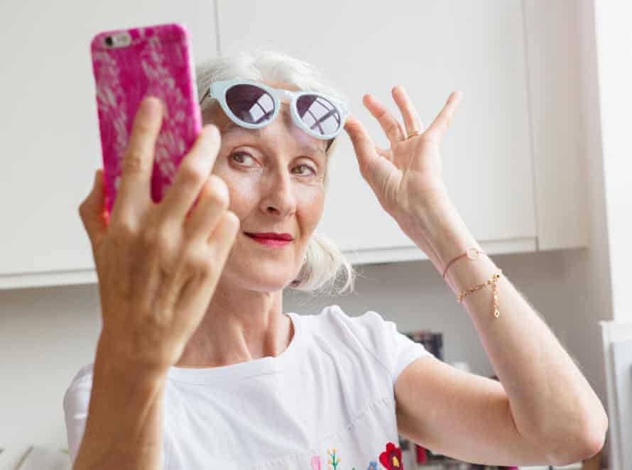 Senior woman takes Selfie