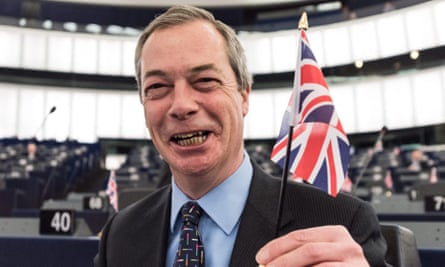 Nigel Farage holds a miniature Union Jack