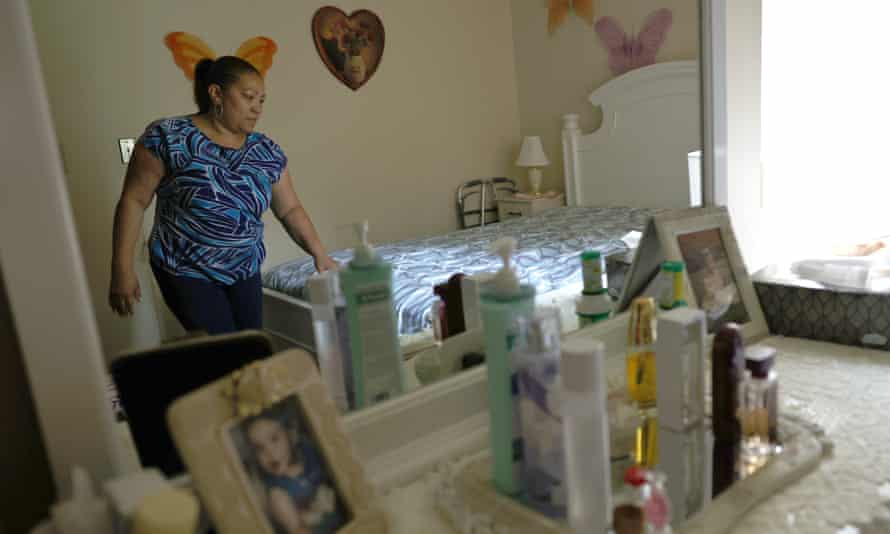 Lidia Vilorio, a home health aide, makes the bed for her patient in Haverstraw, New York. Biden’s American Jobs Plan included $400bn to create jobs and boost wages for millions of women of colour who work as caregivers for the elderly and disabled.