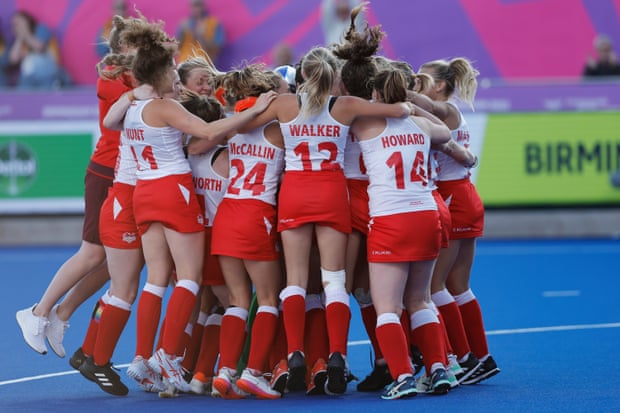 England’s players celebrate with Maddie Hinch after winning the penalty shootout.