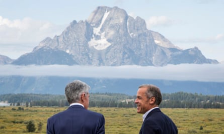 Jerome Powell, left, talks to the then Bank of England governor, Mark Carney, after the Fed chair’s speech at the Jackson Hole symposium in 2019.