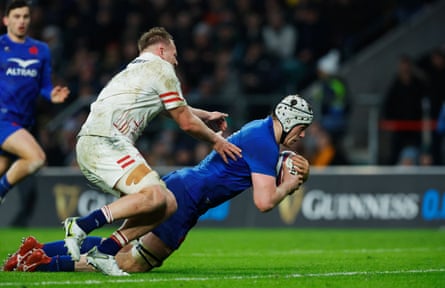 Thibaud Flament scores his side's fourth try whilst under pressure from England’s Alex Dombrandt during the Guinness Six Nations Rugby match between England and France.