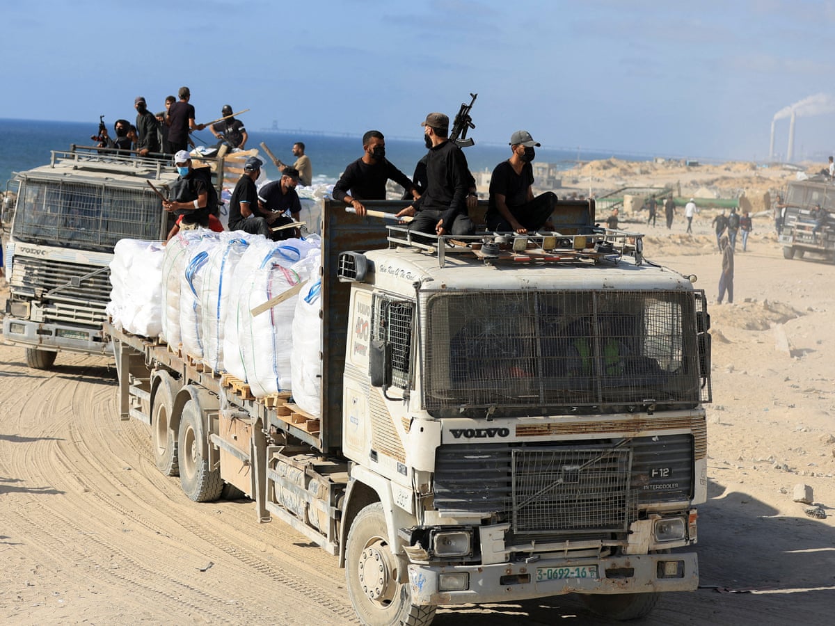 Convincing evidence Israel backed aid convoy looters in Gaza, historian says | Gaza | The Guardian