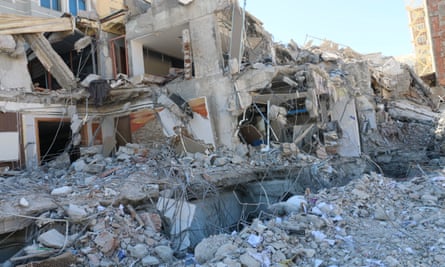 The rubble-strewn site of a hotel