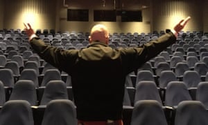 Graham Best, aka Standing Ovation Man, in an empty theatre.