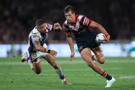 Billy Smith of the Roosters makes a break