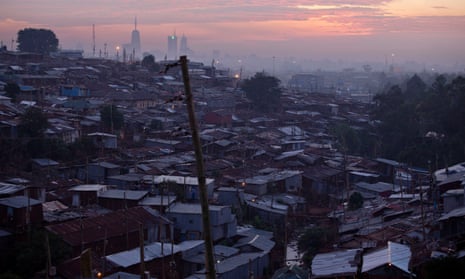 The sun rises over the slum known as Kibera in Nairobi, Kenya