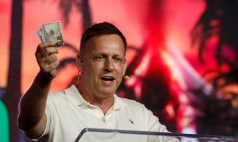 Peter Thiel holding dollar bills.