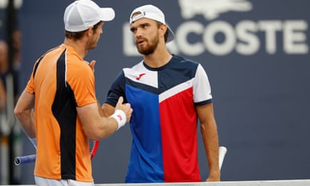 Tomas Machac shakes hands with Andy Murray after beating the Scot