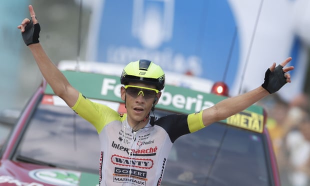 Louis Meintjes crosses the line to claim victory on stage nine.
