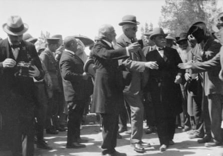 Arthur James Balfour is surroundedd by a group of men