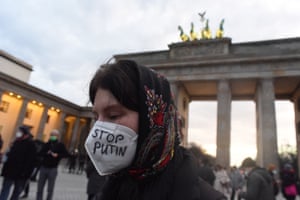 Hundreds of protesters rallied at Brandenburg Gate in Berlin, Germany