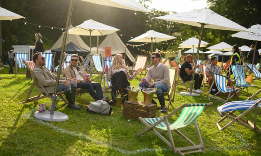 Festivalgoers attend the Gisburne Park Pop-Up festival near Clitheroe, northern England