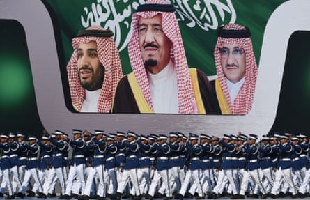 Riyadh, 2017: soldiers march past a poster of (fromleft) deputy Crown Prince Mohammed bin Salman, King Salman, and Crown Prince Mohammed bin Nayef.