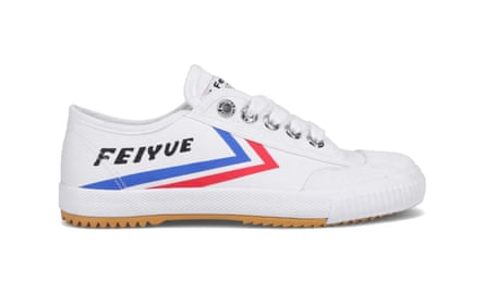 A side view of a Feiyue Fe Lo 1920 canvas pump in white with blue and red stripes and the Feiyue logo on the side.