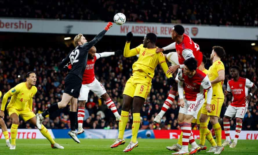 Caoimhín Kelleher: from childhood striker to Liverpool’s cup final keeper | Liverpool 3 Caoimhín Kelleher punches during Liverpool’s Carabao Cup semi-final second leg win at Arsenal.