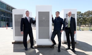 South Australian energy minister Dan van Holst Pelekaan, Neoen Australia managing director Louis de Sambucy and ARENA CFO Ian Kay with the Tesla battery in Adelaide, 19 November 2019