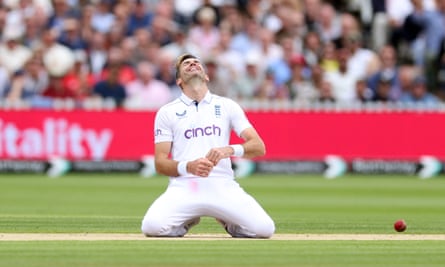 Jimmy Anderson reacts after missing a simple catch to get the final wicket.