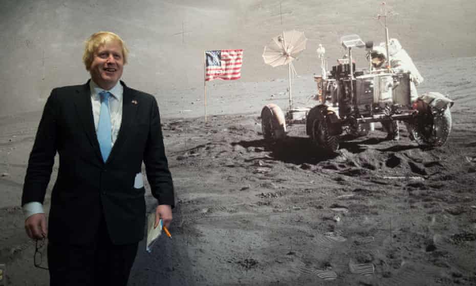 Boris Johnson in front of mural