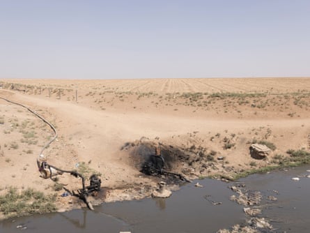 A river flows through an arid landscape.
