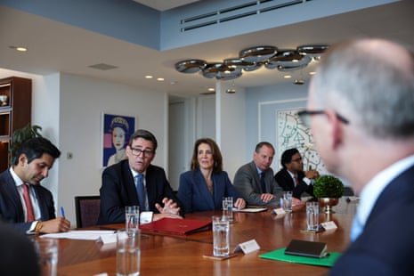 Varun Chandra (left), the prime minister's chief business, investment and trade adviser and Ruth Porat, president and chief Investment Officer at Alphabet and Google, listening to Andy Burnham at a business and investor roundtable in New York today.
