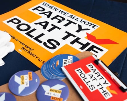 multicolored stickers, pins and posters saying ‘when we all vote’ and ‘party at the polls’