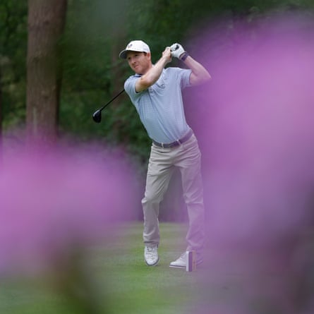 Chris Biggins, a 32-year-old golfer from Alabama with cerebral palsy who is ranked No 3 in the world, tees off the seventh hole