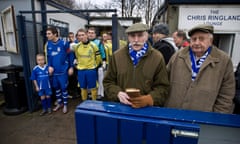 Two elderly Glossop North End supporters waiting for the teams to come out
