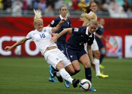 Katie Chapman stretches to make a challenge against France at the 2015 World Cup.