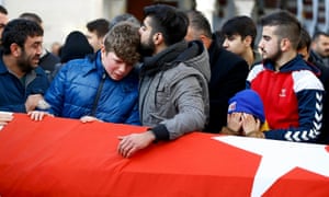 Relatives react at the funeral of Ayhan Arik, a victim of an attack by a gunman at Reina nightclub, in Istanbul, Turkey, 1 January, 2017