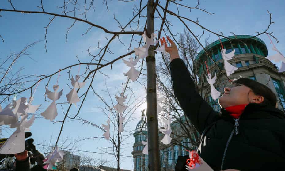 Ukrainians mark fifth anniversary of the violent Maidan protestsepa07378573 Ukrainians decorate a tree along a street with symbolic angels near the memorial for Maidan activists dubbed the 'Heroes of the Heavenly Hundred' and commemorating those who were killed on the Maidan during anti-government protests in 2014, not far from the Independence Square in Kiev, Ukraine, 18 February 2019. Ukrainians mark the fifth anniversary of the escalated violence in Maidan which resulted in at least 100 people being killed. EPA/SERGEY DOLZHENKO