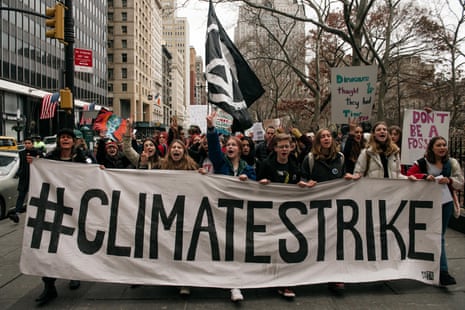 Demonstrators from groups including Extinction Rebellion and Sunrise Movement demand action at a youth-led climate strike in New York in December.