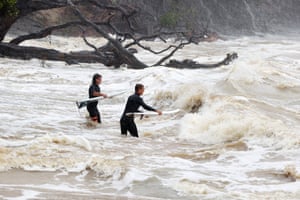 Surfers enter wild water