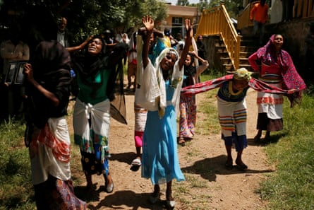 In Denkaka, Kebele, on 3 October, women mourn during the funeral of Tesfu Tadese Biru