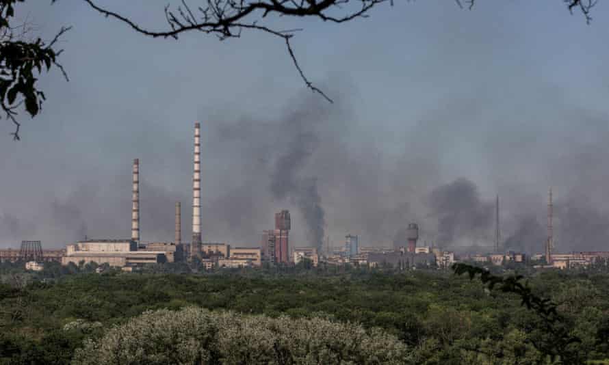 Smoke rises after a military strike on Azot, a chemical factory in Sievierodonetsk, Ukraine.