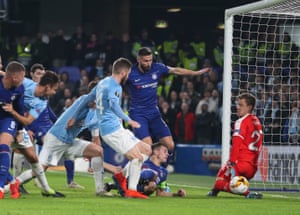 Cessar Azpilicueta of Chelsea, under a pile of Chelsea and Malmo players sees his shot saved by Malmo goalkeeper Johan Dahlin.