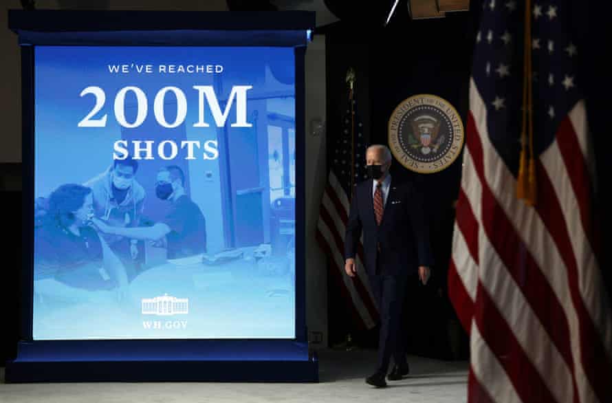 Joe Biden walks to a podium to discuss the state of vaccinations in Washington DC on 21 April.