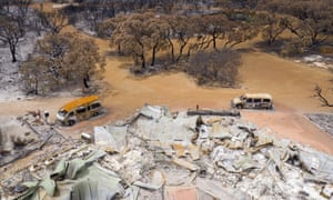 An aerial view of burnt trees, cars and buildings on Kangaroo Island in January