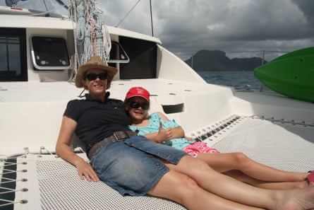 The calm before the storm: Alison Rourke and her daughter Ella sailing towards Hayman Island, before the engine set on fire, they breached the reef and had to be rescued.