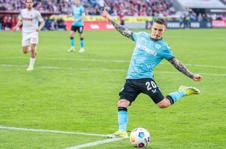 Álex Grimaldo of Bayer Leverkusen scores his team’s second goal against Köln with a sweet strike